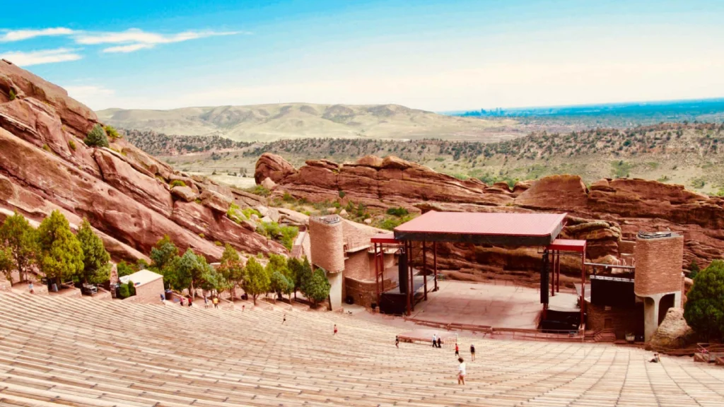 Luxury shuttle driving from Colorado Springs to Red Rocks Amphitheater