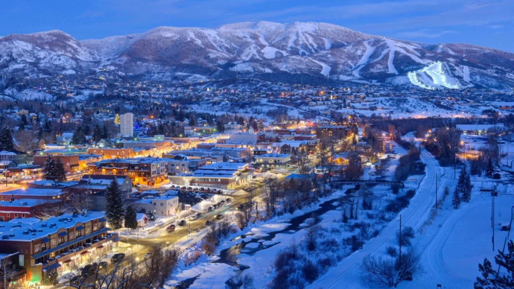 Chauffeured black SUV waiting at DEN for private ride to Steamboat Springs