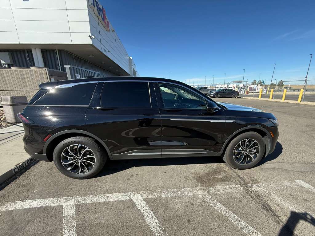 Luxury black car Lincoln Nautilus Denver service