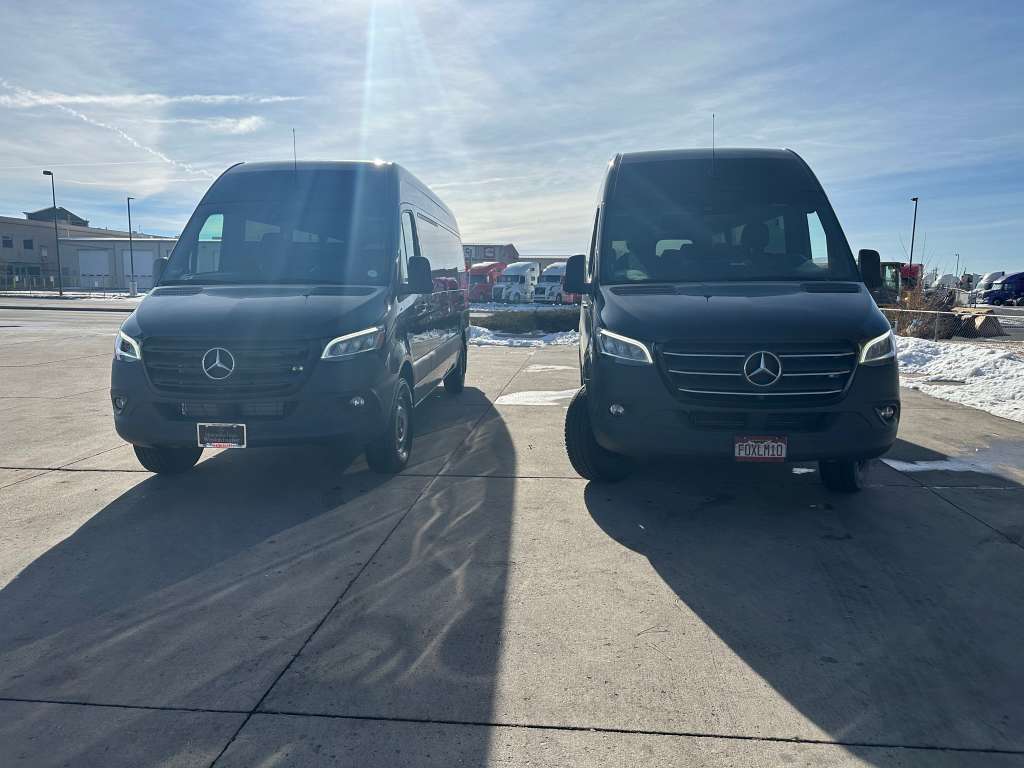 Sprinter van exterior black shuttle service Denver clean view